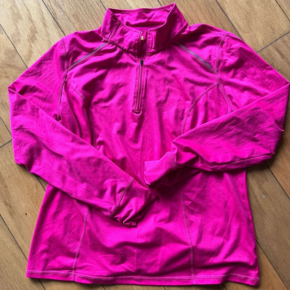 Bright pink half-zip women’s top